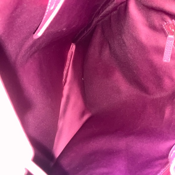 YVES SAINT LAURENT
Leather Heart Embellished Canvas Tote Bag - Picture 8 of 12